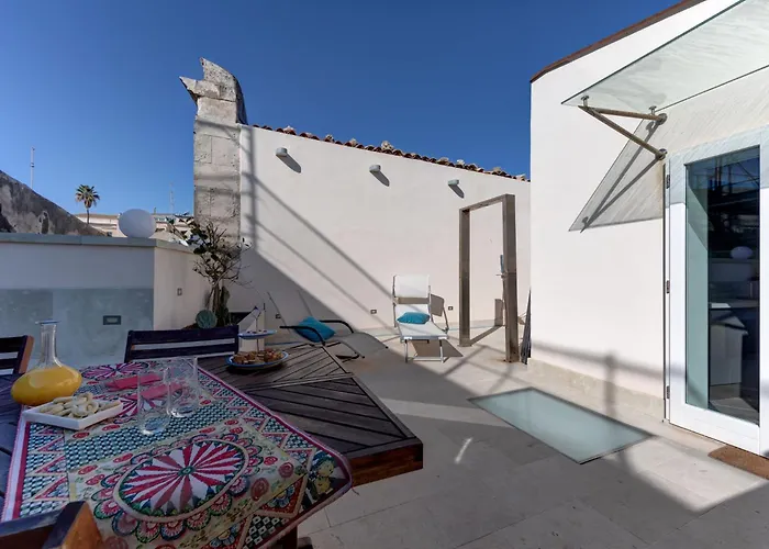 Ortigia Lägenhetshotell 4*